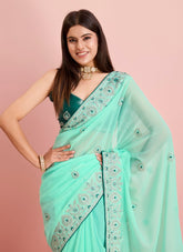 Alluring looking sea green colour saree